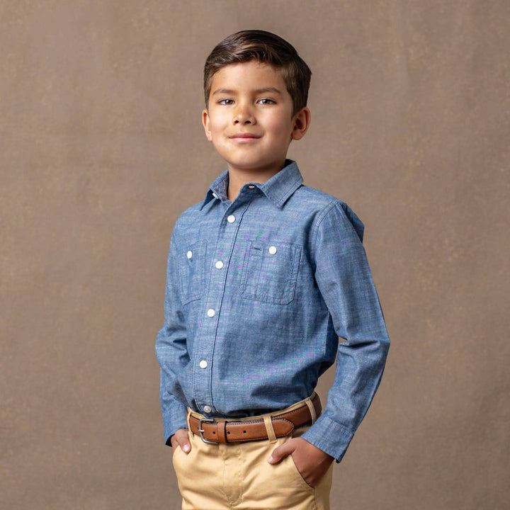 boy model wearing organic chambray button down shirt