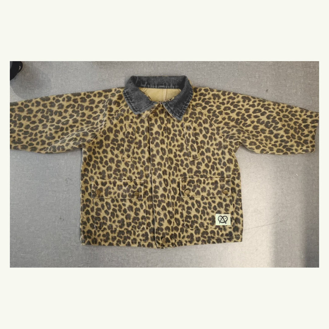 leopard barn jacket on stork